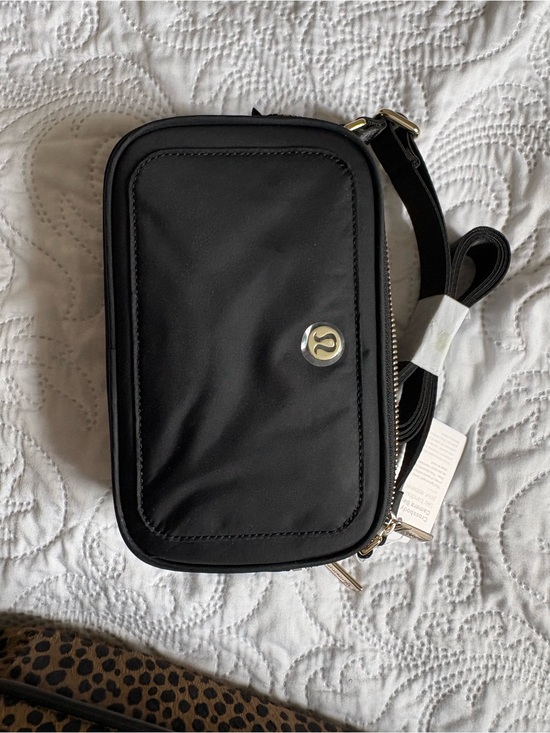 lululemon athletica Handbags - lululemon athletica Black Crossbody Camera Bag with Silver Hardware